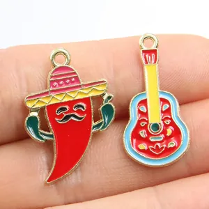 Macro detail view of vibrant Mexican carnival themed chili and guitar enamel charms for DIY