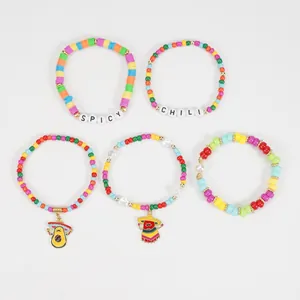 Cinco de Mayo bohemian bead bracelets set with spicy chili and avocado charms.
