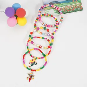 Detail of Cinco de Mayo bohemian bracelets with colorful beads and chili pepper charms