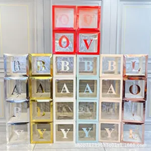 Various multi-color transparent party letter boxes for baby shower and birthday decor