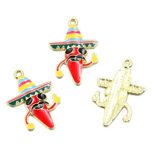 Detail of Mexican fiesta chili charms with colorful sombreros and gold metal back.