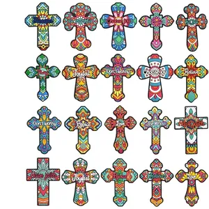 Detailed view of colorful cross fridge magnets with various mandala patterns