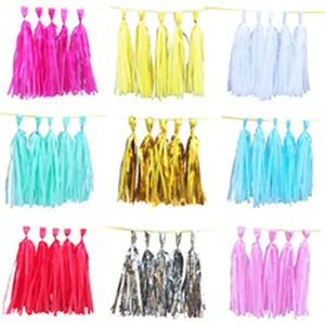 Set of multi-color paper tassel garlands in nine shades for festive party decorations