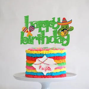 Detailed view of Mexican-themed glitter Happy Birthday cake topper on a colorful cake