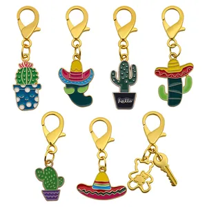 Set of Mexican Fiesta enamel keychains featuring chili, cactus, and sombrero designs.