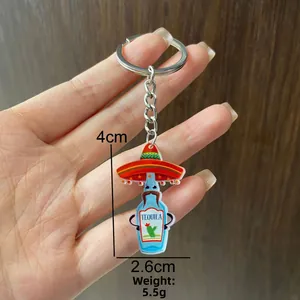 Detailed view of Mexican Tequila bottle keychain with sombrero design