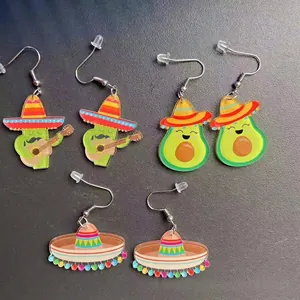 Detail showing colorful acrylic earrings with Mexican cactus, avocado and sombrero designs