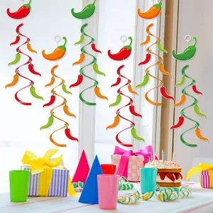 Vibrant Mexican fiesta hanging swirls with colorful chilli pepper designs in party setting