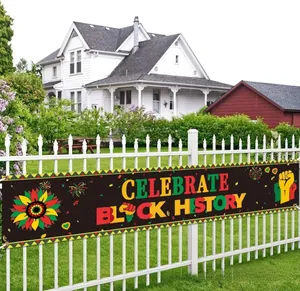 Black History Month decorative fence banner with Pan-African colors and symbols