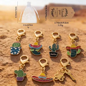 Set of Mexican Fiesta enamel keychains with cactus and sombrero charms plus gift bag