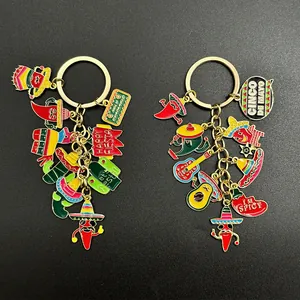 Detailed view of Mexican Fiesta enamel keychains with chili and avocado charms