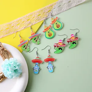 Detailed view of Mexican carnival themed acrylic earrings featuring cute cartoon characters