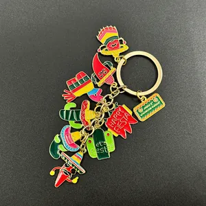 Close-up of vibrant Mexican fiesta keychain with chili and cactus enamel charms
