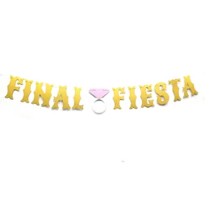 Detailed view of the gold glitter 'FINAL FIESTA' banner for bachelorette party decor