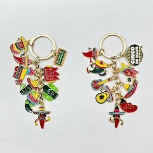 Vibrant Mexican Carnival keychains featuring colorful chili and sombrero charms detail.