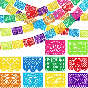 Colorful Mexican Papel Picado banners with traditional Day of the Dead patterns for party decor.
