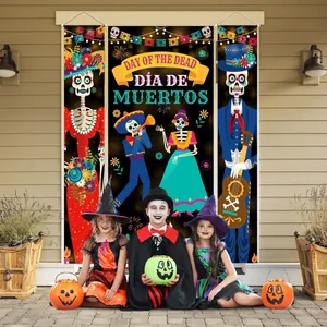 Three children in costumes posing with Day of the Dead door banner set on a porch.