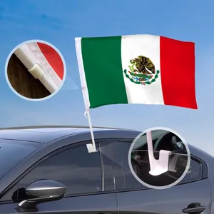 Detailed macro view of Mexico car flag showing window clip installation and reinforced stitching