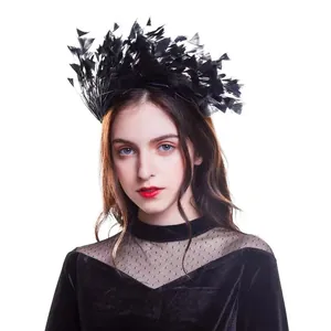 Elegant black feather headband accessory for masquerade parties and gala festive events.