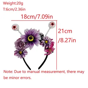 Halloween headband detail showing measurements of eyeball and purple flower decorations