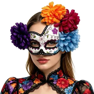Detailed close-up of a Day of the Dead mask with large colorful flowers on a model
