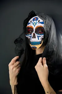 Detailed view of a colorful painted resin skull mask for Mexico Day of the Dead
