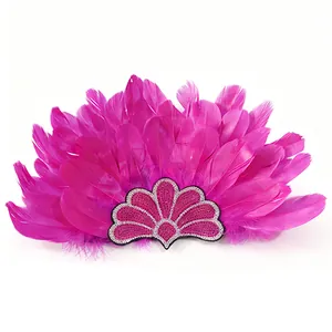 Close-up of vibrant fuchsia feather headband for carnival and festive dance performances