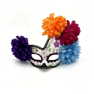 Detailed view of Mexican Day of the Dead floral mask with colorful sugar skull patterns