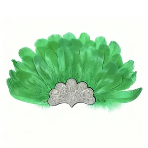Detailed view of vibrant green feather headband with sparkling silver centerpiece decoration