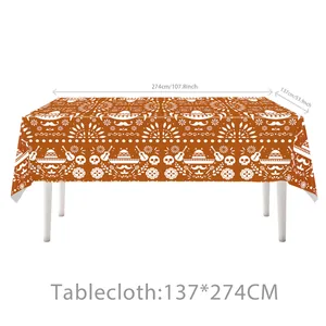 Orange Day of the Dead tablecloth with white skull and guitar patterns, 137x274cm size.