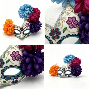 Detailed view of colorful silk flowers and painted patterns on Day of the Dead mask