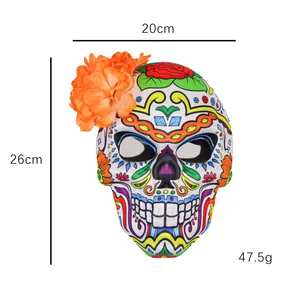 Vue détaillée du masque tête de mort Jour des Morts avec fleur orange et motifs