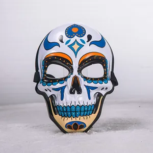 Detail of a Mexican Day of the Dead painted sugar skull resin mask for cosplay event.