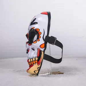 Side view of hand-painted resin skull mask for Day of the Dead cosplay party props