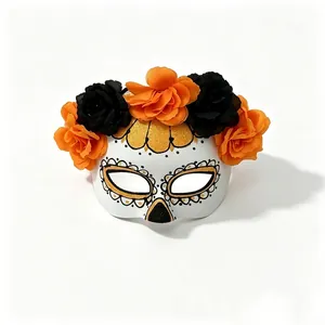Detailed view of the Mexican Day of the Dead mask with black and orange silk flowers