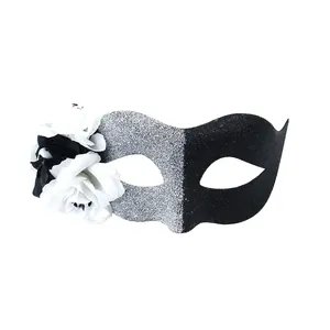 Elegant silver and black glitter half-face masquerade mask with side flower decorations