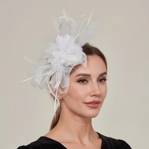 Elegant white mesh and feather fascinator headpiece for weddings, parties, and bridal events