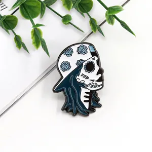 Detailed macro view of a blue sugar skull skater girl enamel pin badge