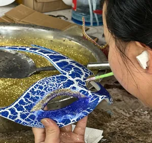 Hand-painted blue and white skull mask for Mexican Day of the Dead masquerade detail view