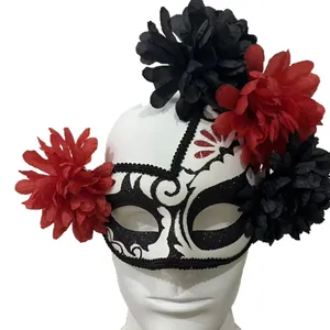 White Day of the Dead masquerade mask with black and red flowers on mannequin head