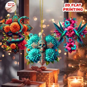 Detailed view of 2D flat printed cross ornaments with floral skull and bird motifs