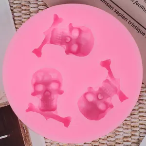 Macro view showing details of pink Halloween skull silicone mold for cake decoration