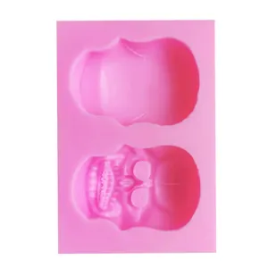 Detailed macro view of pink Halloween skull silicone mold for fondant and chocolate cake decoration
