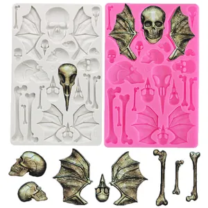 Moule en silicone ailes de crâne et os d'Halloween pour décoration de gâteaux fondant.