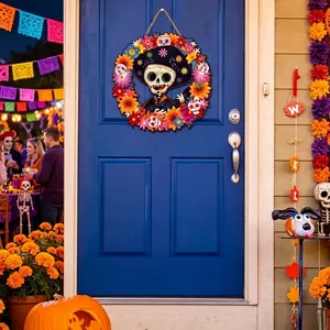 Día de los Muertos wooden door hanger featuring a sugar skull and colorful marigolds