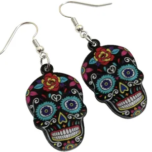 Vibrant Halloween sugar skull drop earrings featuring a colorful floral acrylic design