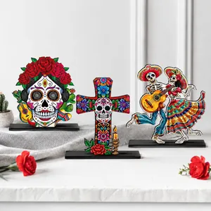 Vibrant Day of the Dead wooden table decor featuring sugar skulls and dancing skeletons
