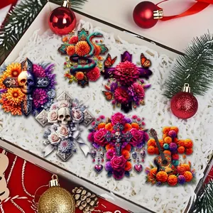 Day of the Dead flat ornaments with floral sugar skull and cross designs for home decor