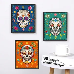 Vibrant Day of the Dead sugar skull wall art set with floral wooden frames