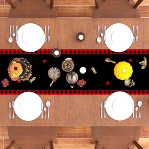 Top view of Day of the Dead table runner with sugar skull and rose motifs on wooden table